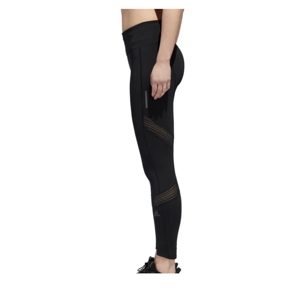New with tags Adidas long , mid rise black tights size xs, with ankle zipper
